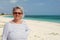 Mature woman on beach, turks and caicos