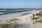 Mature Woman Greets a New Day on Pristine Florida Beach