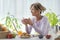 Mature woman having a relaxing breakfast at home