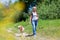 Mature woman hiking with a dog