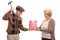 Mature woman holding a piggybank while a man is preparing to break it