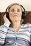 Mature woman listeni music in headphones