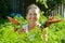 Mature woman picking carrot