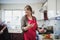 Mature Woman Preparing Food for Dinner Party