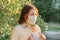 Mature woman in protective medical mask, female outdoor