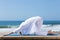 Mature woman stretching beach