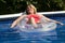 Mature woman at the swimming pool.