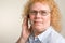 Mature Woman on Telephone Headset