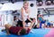 Mature woman training with coach