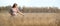 Mature woman in wheat field