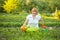 Mature woman working in vegetable garden