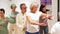 Mature women in a Qi gong class choreographing the exercises