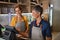 Mature women waitress working at coffee shop