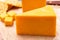 Matured yellow cheddar cheese close up