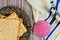 Matza, tallit and kippa on wooden background