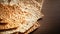 Matzah bread: a thin, unleavened, cracker-like sheet, often with browned spots