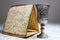 Matzo Matzah and vintage wine glass. Symbolic foods for Jewish Passover. Passover Pesach or Pesah - Jewish holiday