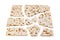 Matzo. Traditional jewish easter bread. Passover holiday symbol. Broken matzo, lies in a heap. Isolated on white. With some free