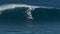 MAUI, HAWAII, USA - DECEMBER 15, 2013: Unknown surfer is riding