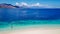 Maumere - A drone shot of a girl playing on the white sand beach