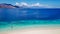 Maumere - A drone shot of a girl playing on the white sand beach