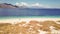 Maumere - A drone shot of a girl playing on the white sand beach