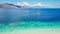 Maumere - Idyllic white sand beach with some other island in the back