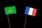 Mauritania flag with French flag isolated on black