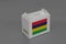 Mauritius flag on white box with barcode and the color of nation flag on grey background. The concept of export trading from