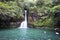 Mauritius. Small falls in Valley of 23 colors of the Earth park in Mare-aux-Aiguilles,