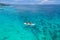 Mauritius vacation, couple man and woman in a kayak in a blue ocean in Mauritius.