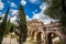 The Mausoleum of Hadrian, usually known as Castel Sant Angelo English: Castle of the Holy Angel. Towering cylindrical building