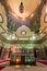 Mausoleum at Mamluk era Mosque and Madrasa of Sultan Hassan with colorful marble mosaic, and carved inscription, Cairo