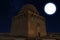 Mausoleum of Sultan Sanjar in Ancient Merv at night under the full moon.