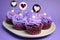 Mauve purple decorated cupcakes - closeup horizontal.