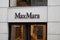 max mara brand text facade store signage and logo sign on shop wall facade