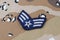 May 12, 2018. US AIR FORCE Senior Airman rank patch on Desert Battle Dress Uniform background