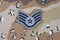 May 12, 2018. US AIR FORCE Staff Sergeant rank patch on desert camouflage uniform background