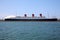 May 19 2021. Long Beach California: Queen Mary sits docked in the Long Beach California Harbor. Tourist and People can enjoy a day