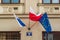 May 2, 2020 - Flag of Poland, Krakow and the European Union on the facade of the tenement house