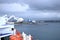 May 20 2023 - Olbia, Sardinia, Italy: : the ferry approaching the the port of Olbia on a cloudy day