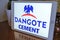 May 2021 Milan, Italy: Dangote cement company close-up on tablet screen in the office. Dangote cement illustrative brand