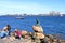 May 23 2022 - Copenhagen, Denmark: Tourists near the iconic statue of The Little Mermaid