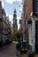 May 5, 2020, Amsterdam, Holland, the Netherlands - Westerkerk in the end of an empty pittoresque street