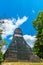 Maya pyramid in the rainforest by Tikal