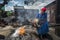 Maya woman performing a traditional mayan ritual in the cemetery of the town of Chichicastenango