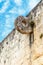 Mayan football game ring on the stone wall, Chichen Itza archaeological site, Yucatan, Mexico