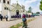 Mayan woman walks past church, Parramos, Guatemala