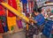 Mayan woman weaving with strap loom in Antigua, Guatemala.