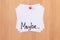 MAYBE.. - White Sticky Notes with Written Word MAYBE, Pinned to the Wooden Message Board